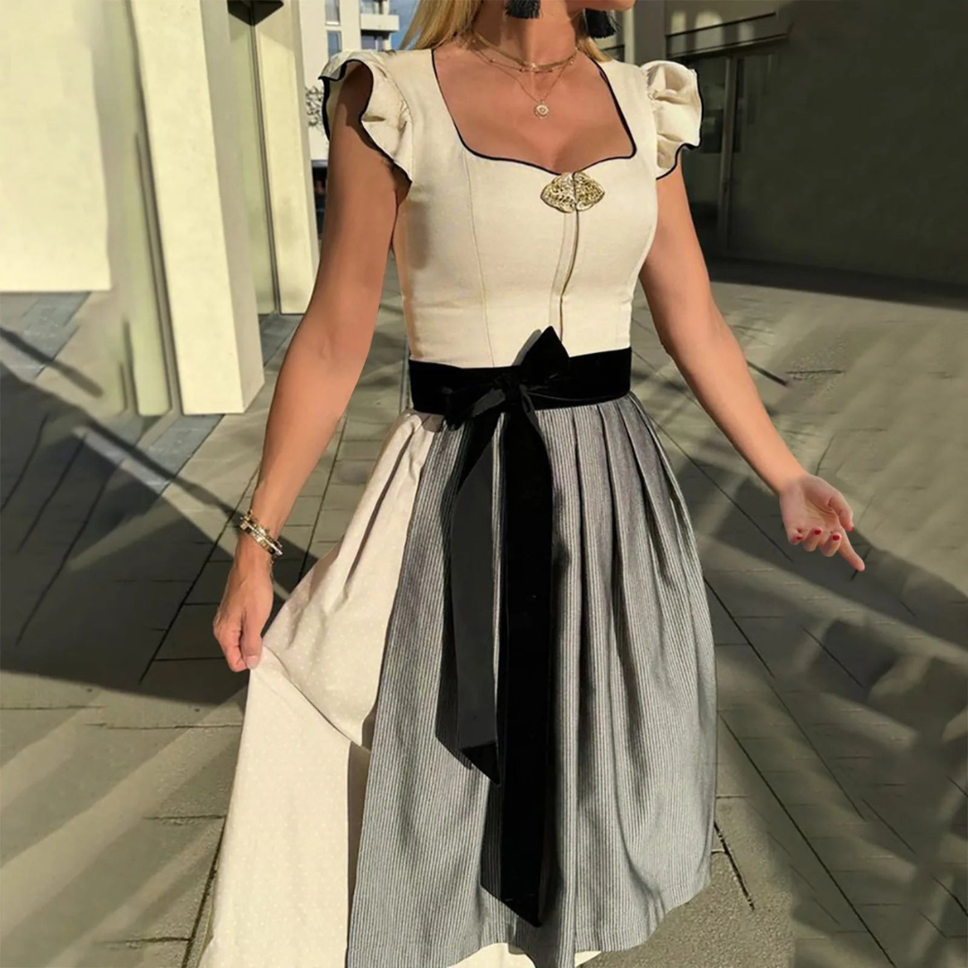 Elegantes Damen Oktoberfest Dirndlkleid mit schicker Schürze, formvollem Schnürmieder und authentischen Details