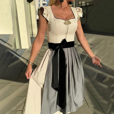Elegantes Damen Oktoberfest Dirndlkleid mit schicker Schürze, formvollem Schnürmieder und authentischen Details