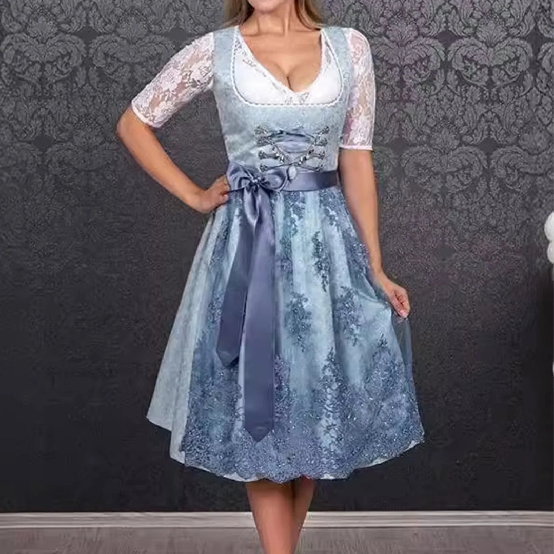 Elegantes Damen-Oktoberfest-Dirndl mit stilvoller Schürze und modischem Schnürmieder