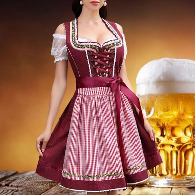 Elegantes Damen-Oktoberfest-Dirndlkleid mit charmanter Schürze, stilvollem Schnürmieder und attraktiven Dekorelementen