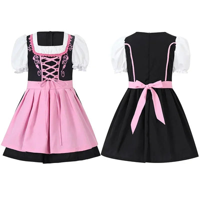 Charmantes Mädchen-Dirndlkleid mit Schürze im authentischen traditionellen Stil